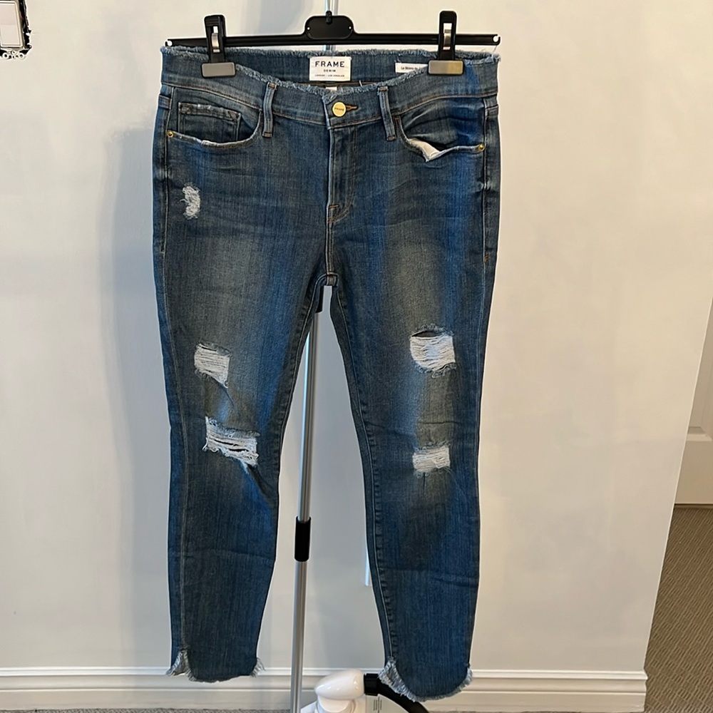 Women’s Frame ripped jeans with scalloped bottom